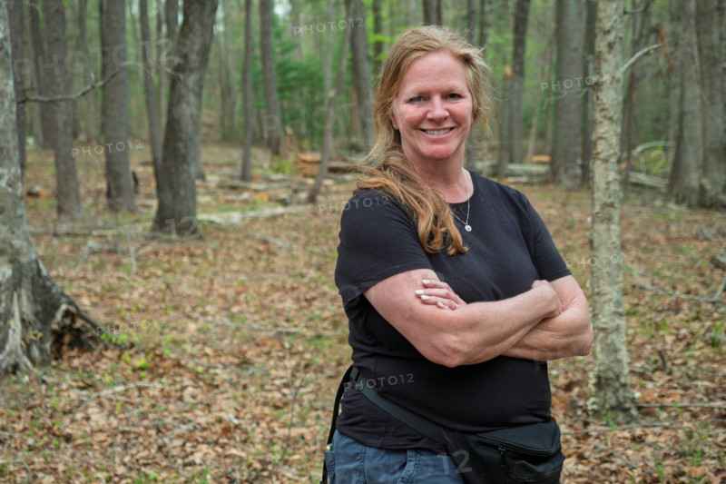 Portrait of smiling woman in forest. Blacksburg, Virginia, United States