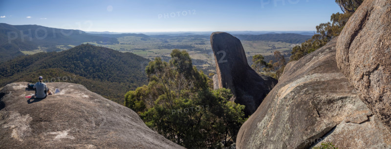 Rear view of woman on top of Gibraltar Peak. Canberra, Australian Capital Territory, Australia
