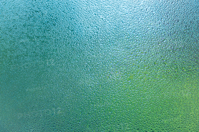 Condensation patterns on glass with green tones. Leura, New South Wales, Australia