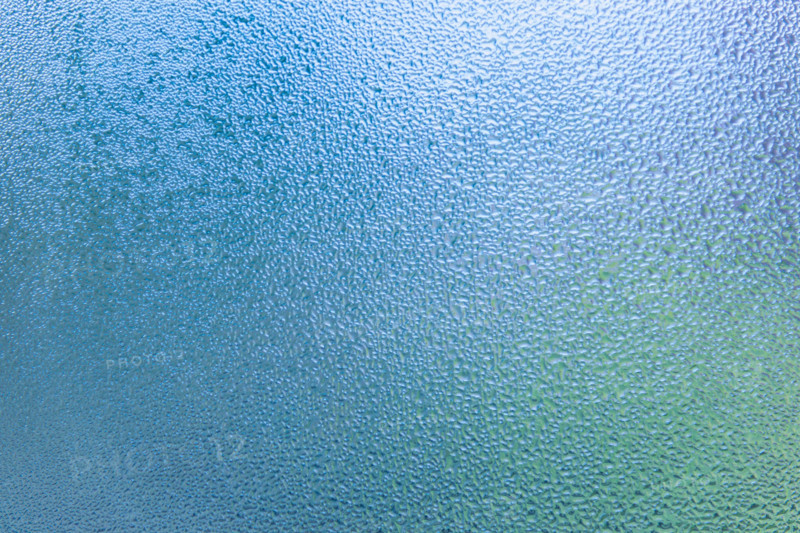 Condensation patterns on glass with cool tones. Leura, New South Wales, Australia