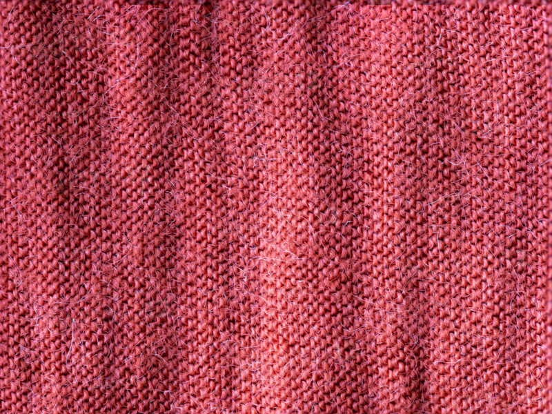 Textured detail of pink linen blend fabric. Leura, New South Wales, Australia