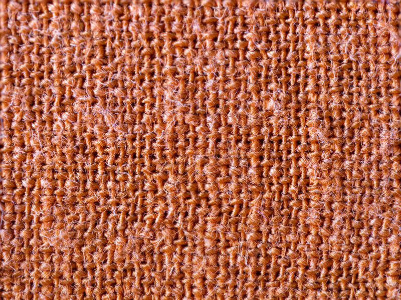 Textured detail of terracotta cotton fabric. Leura, New South Wales, Australia