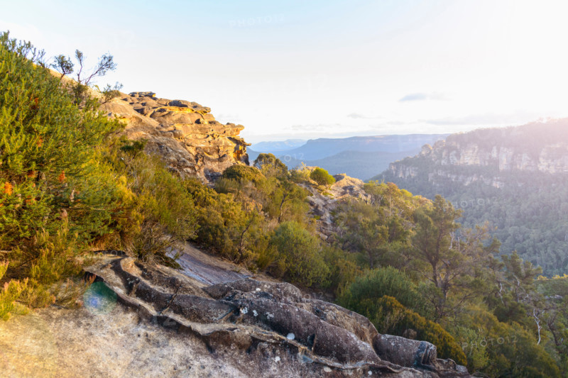 Golden sunset view of Three Sisters and Jamison Valley. Leura, New South Wales, Australia