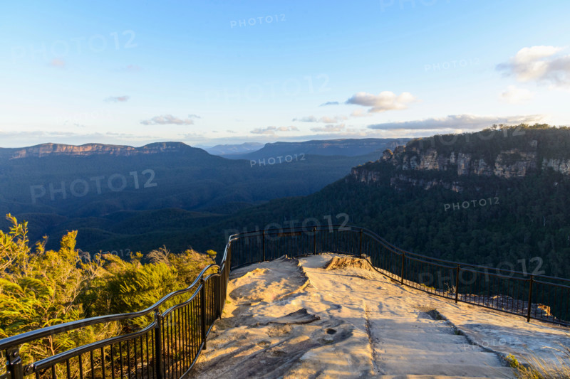 Golden sunset view of Three Sisters and Jamison Valley. Leura, New South Wales, Australia