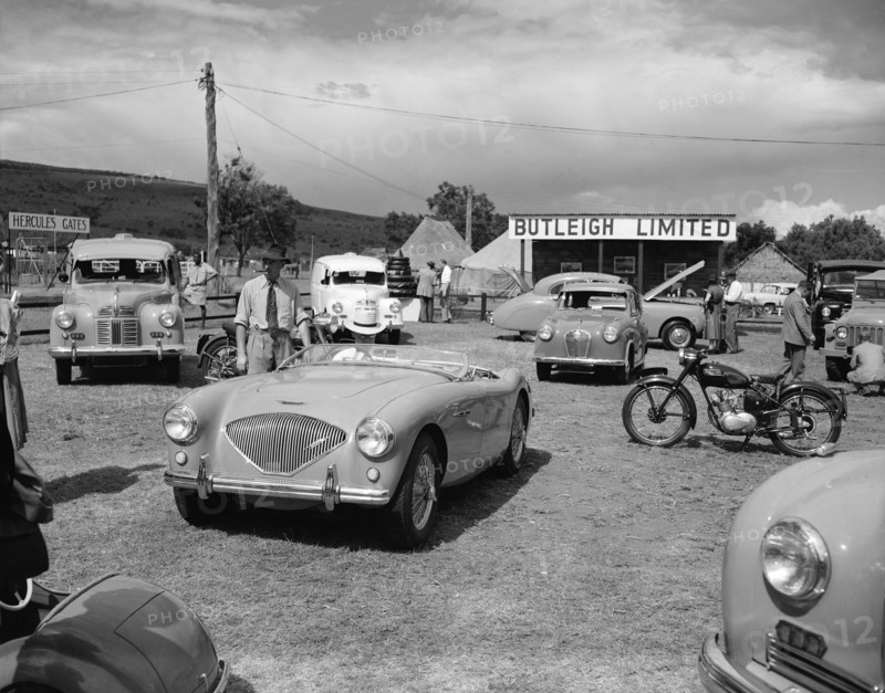 Butleigh Ltd. Butleigh Ltd at the Royal Show. A range of vehicles including cars and motorcycles are on display. Nakuru, Kenya, 1 October 1954. Nakuru, Rift Valley, Kenya, Eastern Africa, Africa.