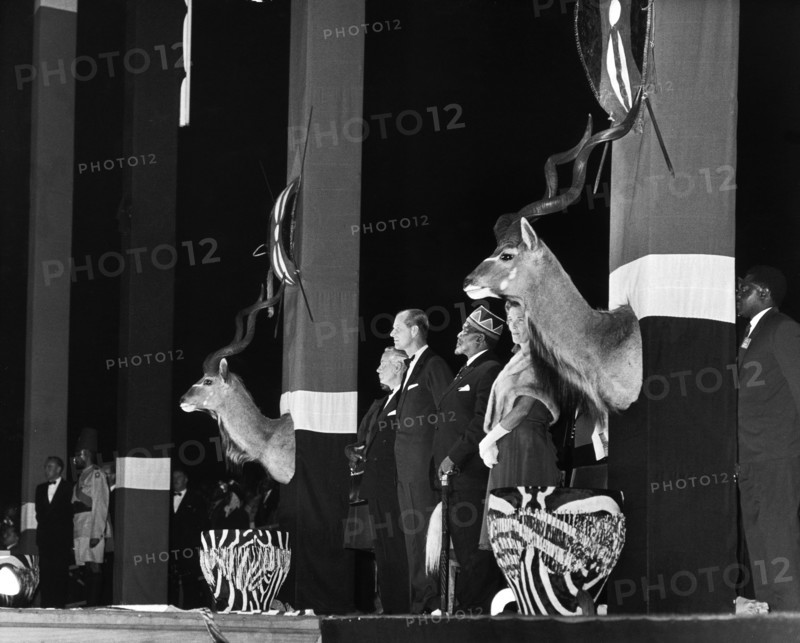 Independence ceremonies at Nairobi. Prince Philip, Duke of Edinburgh, stands next to Jomo Kenyatta, prime minister of newly independent Kenya, at the transfer of power ceremony in Uhuru Park. Nairobi, Kenya, 12 December 1963. Nairobi, Nairobi Area, Kenya, Eastern Africa, Africa.