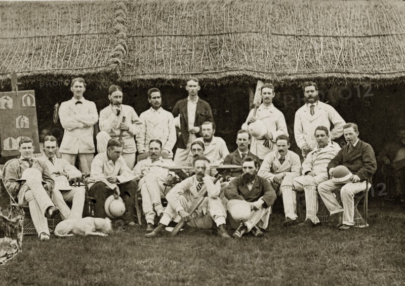 Satara and Poona cricket teams. Group portrait of the Satara and Poona cricket teams dressed in their sporting whites outside a clubhouse. Bombay (Mumbai), India, circa 1875. Mumbai, Maharashtra, India, Southern Asia, Asia.