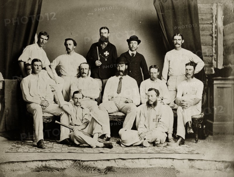Members of the south Bombay cricket team. Members of the south Bombay cricket team pose for a studio camera dressed in their sporting whites. Bombay (Mumbai), India, circa 1875. Mumbai, Maharashtra, India, Southern Asia, Asia.