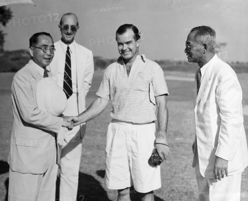 Winner of the Burma Open Championship. The President of the Rangoon Golf Club gives a congratulatory handshake to George Murray, the proud winner of the Burma Open Championship. Rangoon (Yangon), Burma (Myanmar), circa 1952. Yangon, Yangon, Burma (Myanmar), South East Asia, Asia.