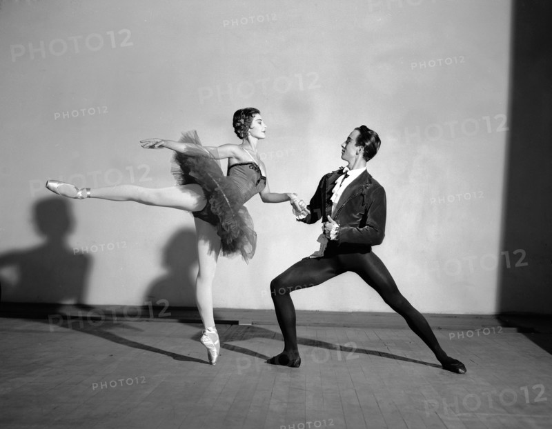 Daphne Dale and Nicholas Polajenko. Dancers Daphne Dale and Nicholas Polajenko in mid-performance, wearing traditional ballet costumes. Kenya, 28 October 1955. Kenya, Eastern Africa, Africa.