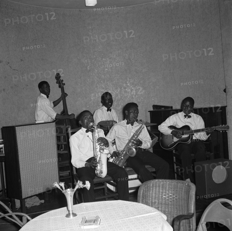 Musicians at the SJAK dance. A band of African musicians play a variety of musical instruments at a dance held for the Sports Journalists Association of Kenya (SJAK). Kenya, 19 August 1955. Kenya, Eastern Africa, Africa.