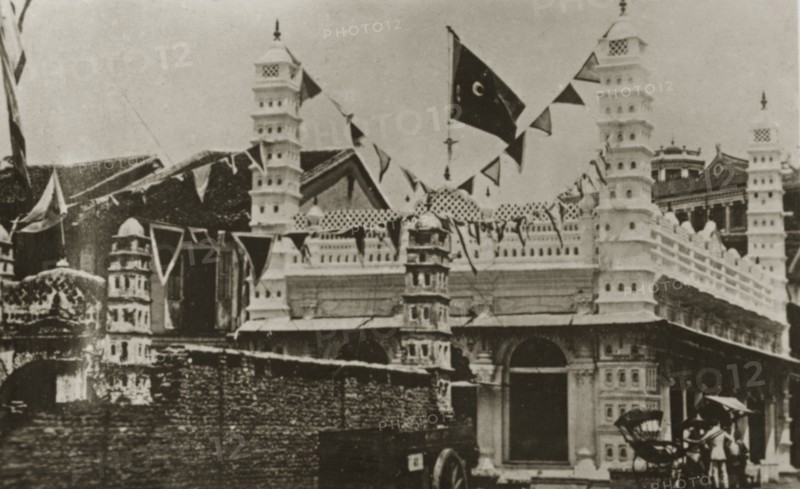 Singapore mosque. Strings of flags decorate an Indian-style mosque in the centre of town. Singapore, Straits Settlements (Singapore), 10-18 February 1924. Singapore, Central (Singapore), Singapore, South East Asia, Asia.