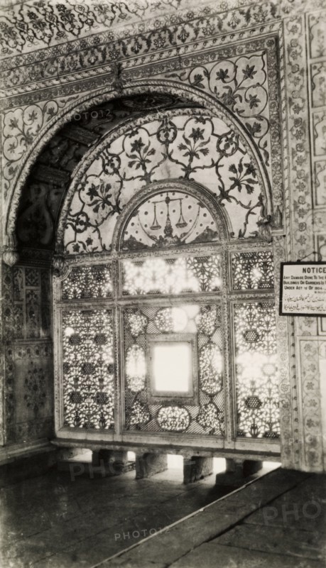 Scales of Justice' screen. An intricately carved marble screen in the Khas Mahal. The semi-circular panel of the screen depicts a crescent moon, stars and the scales of justice, the latter used as a regal emblem. The lower section is carved in a floral and lattice work design. Delhi, India, circa 1954. Delhi, Delhi, India, Southern Asia, Asia.
