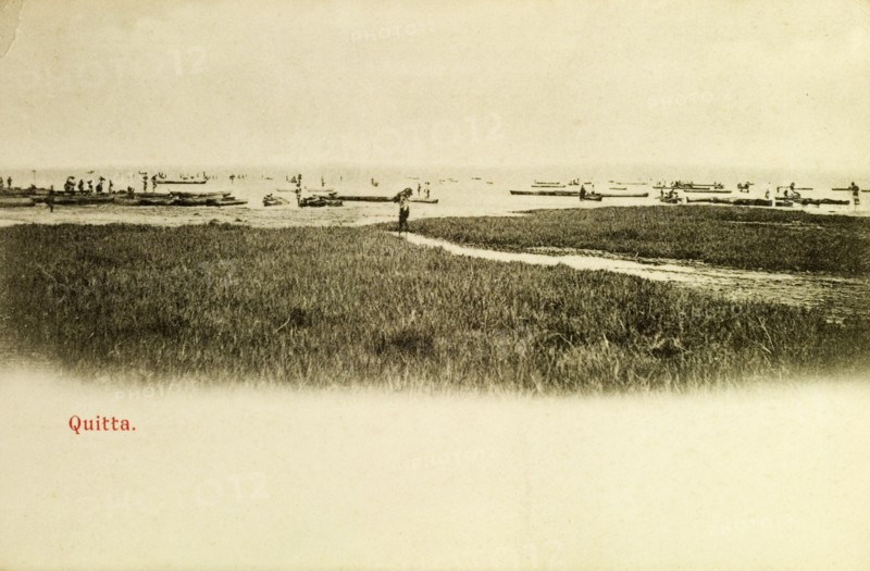 Boats at Quitta, Gold Coast. Fishing vessels at sea off the coast at Quitta. Quitta, Gold Coast (Ghana), circa 1920. Quitta, West (Ghana), Ghana, Western Africa, Africa.