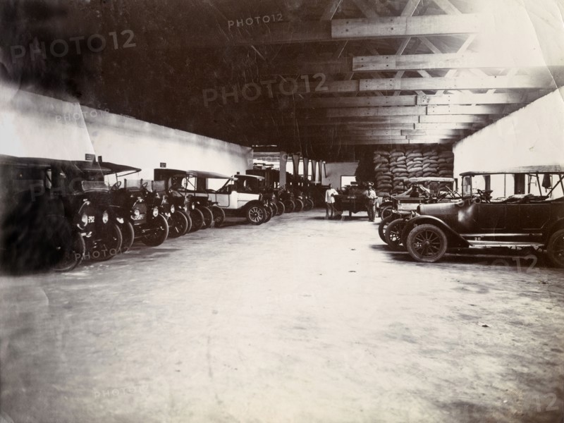 Swanzy garage, Gold Coast. Cars lined up in the Motor Transport Depot of F. & A. Swanzy Limited. Accra, Gold Coast (Ghana), April 1918. Accra, East (Ghana), Ghana, Western Africa, Africa.