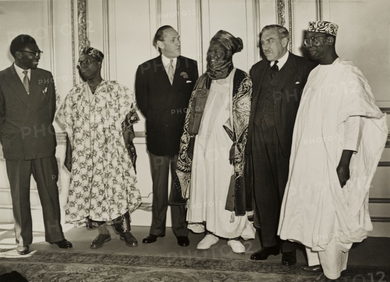 Delegates at the 1957 Lancaster House Conference. British and Nigerian delegates meet at the 1957 Lancaster House Conference, one of two meetings where the federal constitution for an independent Nigeria was prepared. The men are identified left to right as: the Nigerian High Commissioner in London, Chief Obafemi Awolowo (Premier of Western Nigeria), Alan Tindal Lennox-Boyd (British Colonial Secretary), Ahmadu Bello (Sardauna of Sokoto and first Premier of Northern Nigeria), Sir James Robertson (Governor General of Nigeria) and Dr Nnamdi Azikiwe (Premier of Eastern Nigeria). London, England, 1957. London, London, City of, England (United Kingdom), Western Europe, Europe .