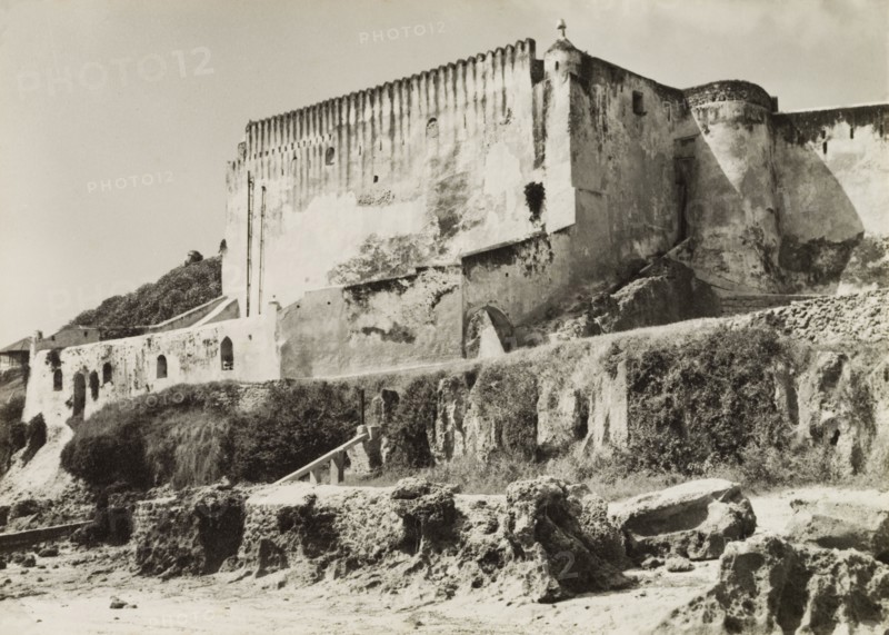 Fort Jesus on Mombasa Island. View of Fort Jesus, a Portuguese fort built on Mombasa Island in 1593 to guard the Old Port of Mombasa. At the time of this photograph, and up until 1958 while Kenya was a British colony, the fort was used as a government prison. Mombasa, Kenya, circa 1950. Mombasa, Coast, Kenya, Eastern Africa, Africa.