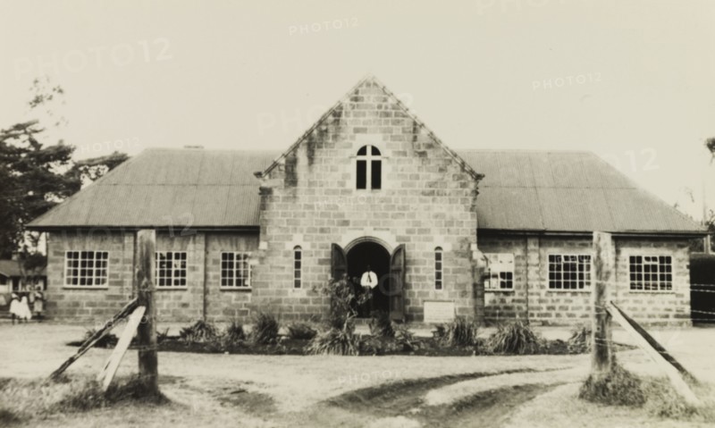 St. Paul's United Theological College, Limuru. Exterior shot of St. Paul's United Theological College in Limuru, a college established by missionaries to train African ordinands for the priesthood and to educate their wives. Limuru, Kenya, circa 1956. Limuru, Central (Kenya), Kenya, Eastern Africa, Africa.