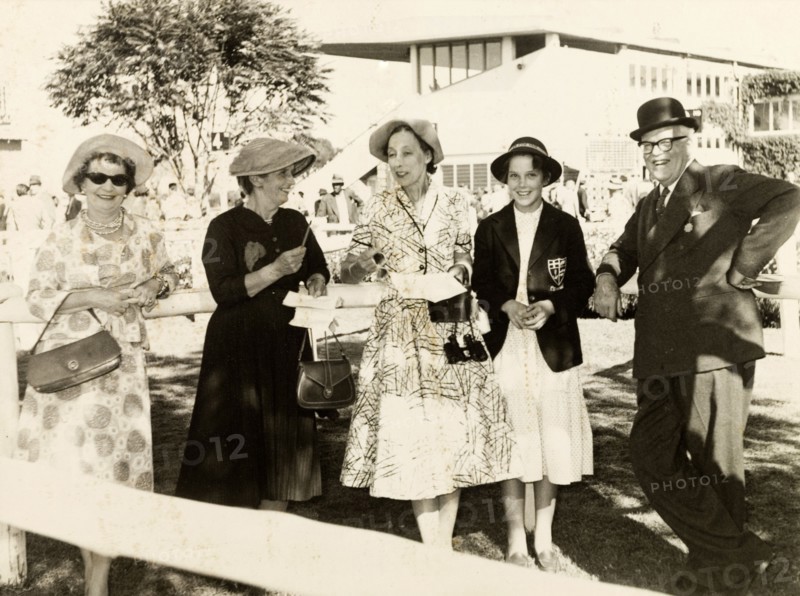 A day at the races, Nairobi. Mr and Mrs Pughe enjoy a day at Nairobi horse races with their daughter, Karoline, and two companions. Nairobi, Kenya, circa 1956. Nairobi, Nairobi Area, Kenya, Eastern Africa, Africa.