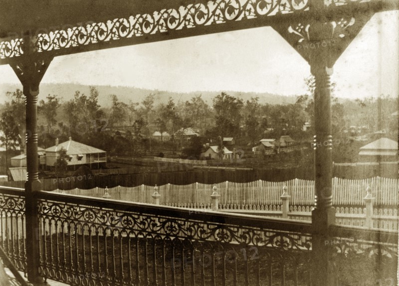 View from the veranda at 'Nundora'. View across neighbouring gardens from the veranda of the Brodribb family's house 'Nundora', taken, according to the original caption, at '5.15'. Toowoomba, Australia, 23 July 1890., Queensland, Australia, Australia, Oceania.