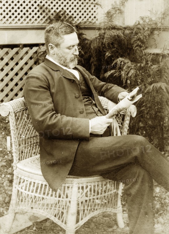 Dr Taylor relaxes at 'Nundora'. Portrait of a well-dressed gentleman identified as 'Dr Taylor' relaxing with a newspaper in the garden of 'Nundora', the Brodribb family's house. Toowoomba, Australia, circa 1895. Toowoomba, Queensland, Australia, Australia, Oceania.