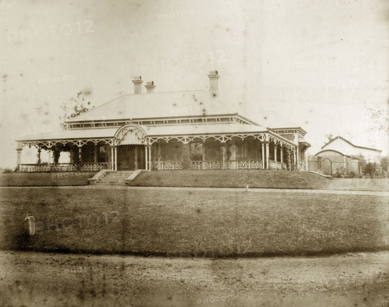 House called 'Wyalla', Australia. Orderly lawns surround 'Wyalla', a large single-storey colonial house with wide verandas and multiple chimneys. Toowoomba, Australia, circa 1905. Brisbane, Queensland, Australia, Australia, Oceania.