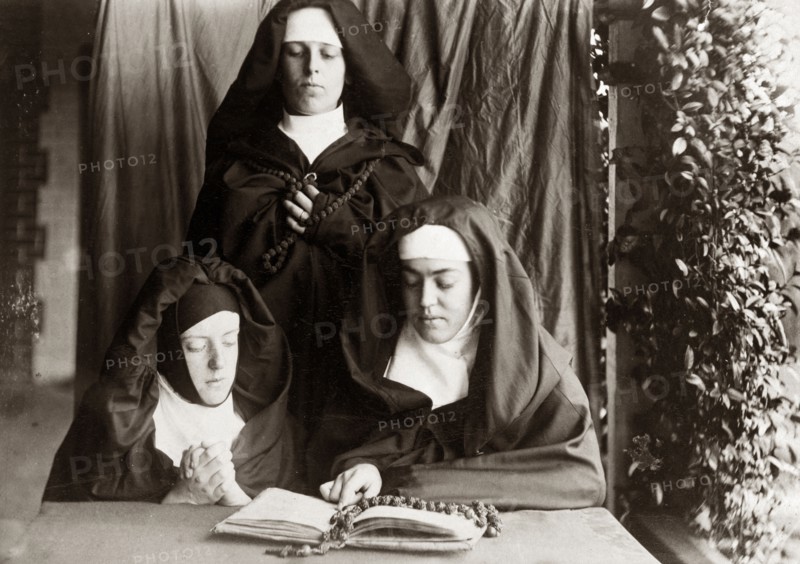 Dressed up as nuns, Australia. Prunella ('Prue') Brodribb, pictured right, and two friends pose for the camera dressed up as nuns. Probably Toowoomba, Australia, circa 1895. Toowoomba, Queensland, Australia, Australia, Oceania.