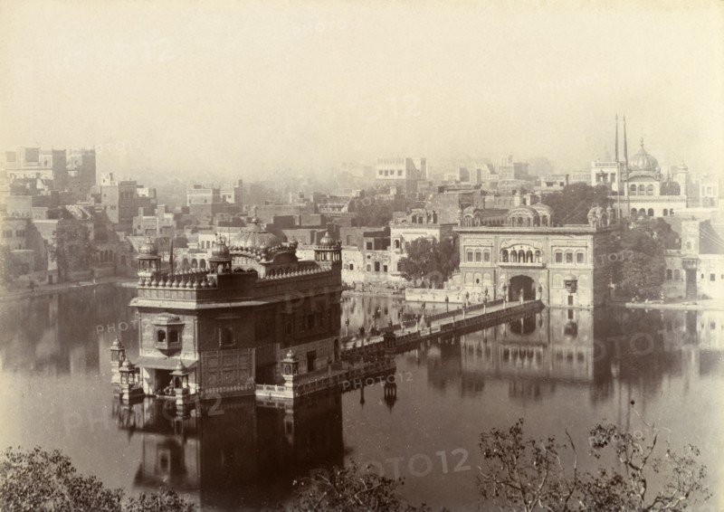 The Harimandir Sahib at Amritsar. A misty pool surrounds the Harimandir Sahib, or Golden Temple, the most sacred gurdwara (Sikh temple) in all of Sikhism. Amritsar, India, circa 1895. Amritsar, Punjab, India, Southern Asia, Asia.
