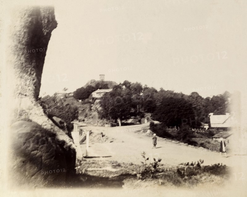 Pindi Point, Murree. View of a road on the outskirts of Murree. Identified as 'Pindi Point', the original caption does not state whether the photograph looks towards or out from Pindi Point. Murree, Punjab, India (Punjab, Pakistan), circa 1895. Murree, Punjab, Pakistan, Southern Asia, Asia.