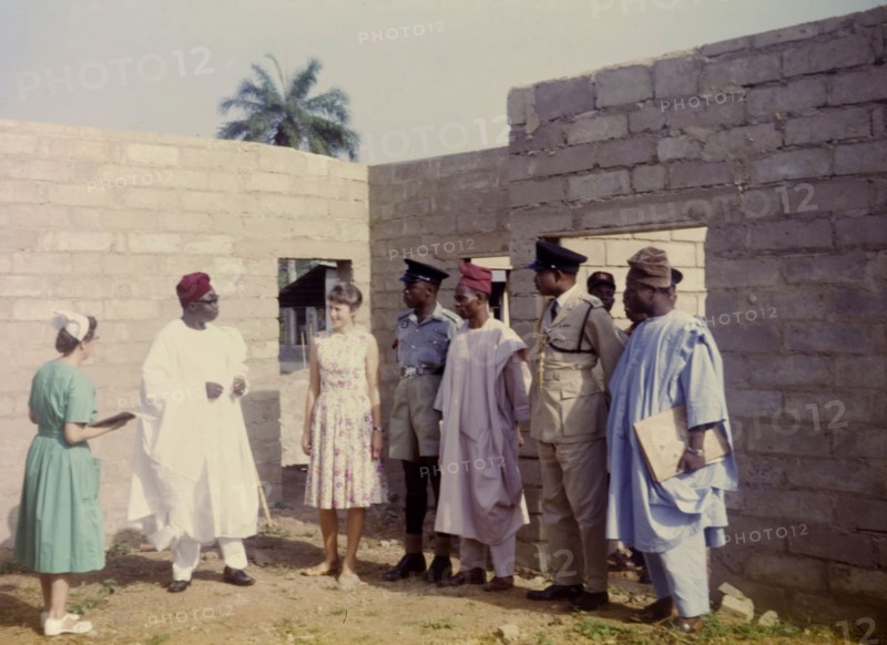 Governor Fadahunsi visits a Church of Nigeria hospital. Sir Chief Joseph Odeleye Fadahunsi (b.1901), Governor of Western Nigeria from December 1962 to January 1966, visits the construction site of a new ward at a Church of Nigeria hospital. Nigeria, November 1963. Nigeria, Western Africa, Africa.
