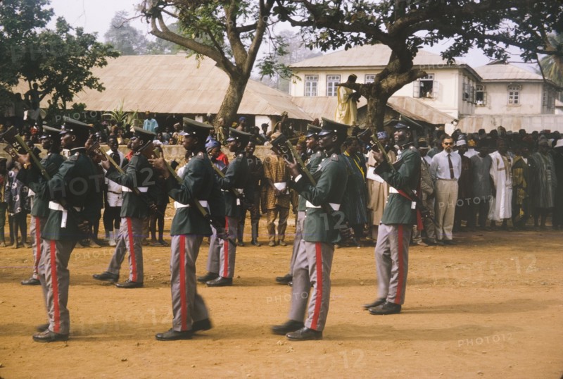 Fajuyi's state funeral. A group of uniformed military men parade with guns at the state funeral of Lieutenant Colonel Francis Adekunle Fajuyi. Ado Ekiti, Nigeria, 1966. Ado Ekiti, Ekiti, Nigeria, Western Africa, Africa.