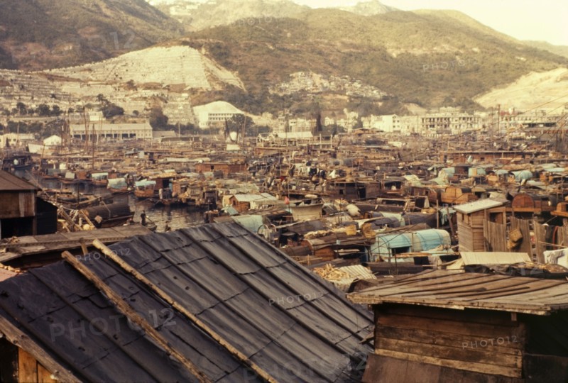 Sampan city. Hundreds of sampans moored in Aberdeen Bay, cram together, filling every available inch of water. Aberdeen, Hong Kong, People's Republic of China, January 1961. Aberdeen, Hong Kong, China, People's Republic of, Eastern Asia, Asia.