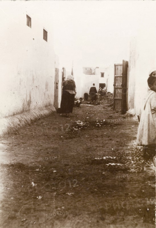Casablanca alleyway. Children play in a dirty back alley in the centre of Casablanca. Casablanca, Morocco, 1898. Casablanca, Casablanca, Morocco, Northern Africa, Africa.
