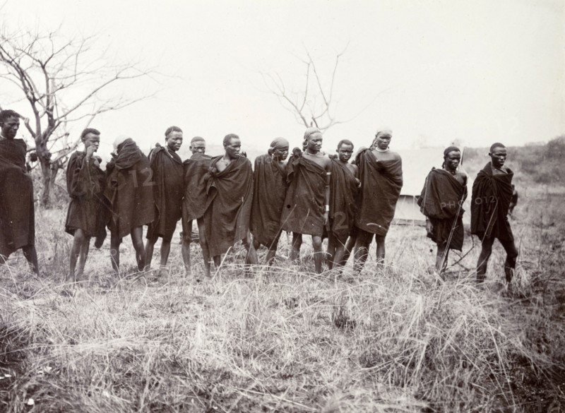 Porters on hunting safari. Kenyan porters assist Frederick Stanbury and a Protectorate colonial officer, Geoffrey Archer, on a hunting safari to Lake Baringo. British East Africa (Kenya), 1906. Kenya, Eastern Africa, Africa.