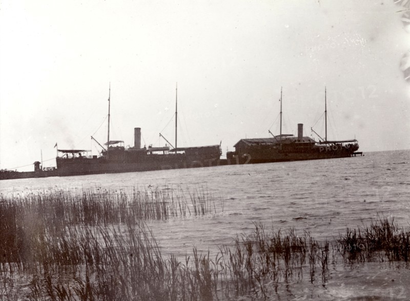 Lake steamers on Lake Victoria. The masts and funnels of two large lake steamers are silhouetted against the sky. Lake Victoria, British East Africa (Kenya), 1906., Nyanza, Kenya, Eastern Africa, Africa.