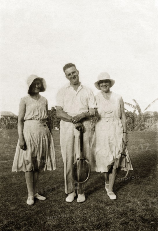 Margaret Trotter at Lagos. Margaret Trotter (right) poses for the camera with friends. The group wear sporting whites and hold tennis racquets. Lagos, Nigeria, April 1932. Lagos, Lagos, Nigeria, Western Africa, Africa.