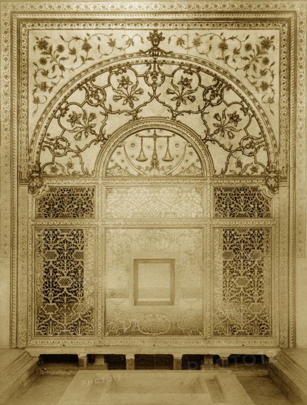 Scales of Justice' screen. An intricately carved marble screen in the Khas Mahal. The semi-circular panel of the screen depicts a crescent moon, stars and the scales of justice, the latter used as a regal emblem. The lower section is carved in a floral and lattice work design. Delhi, India, circa 1885. Delhi, Delhi, India, Southern Asia, Asia.
