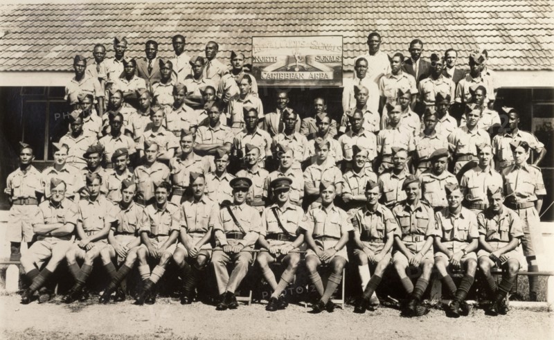 Royal Corps of Signals, Caribbean. The Caribbean Area regiment of the Royal Corps of Signals assemble outdoors for a group portrait at their headquarters. Jamaica, 1943. Jamaica, Caribbean, North America .