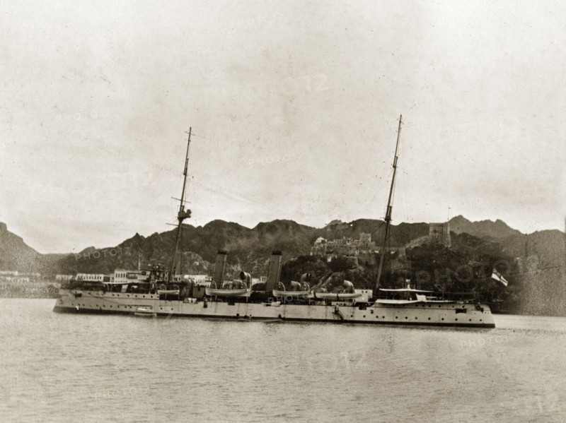 HMS 'Philomel'. HMS 'Philomel', a naval steamer belonging to the Persian Gulf Operations Fleet, floats off shore. Probably the Persian Gulf, circa 1900., Middle East, Asia.