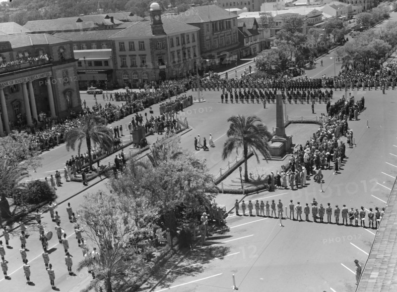 Armistice Day in Nairobi. View taken from the Torrs Hotel in central Nairobi of an Armistice Day memorial service. The streets surrounding the war cenotaph are closed for a military procession and crowds of onlookers line the pavements. Nairobi, Kenya, 9 November 1952. Nairobi, Nairobi Area, Kenya, Eastern Africa, Africa.