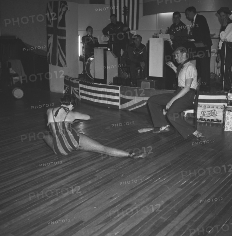 Pam and Hal dancing. Two dancers identified as Pam and Hal, perform at the cabaret of a square dance party. Kenya, 18 December 1952. Kenya, Eastern Africa, Africa.