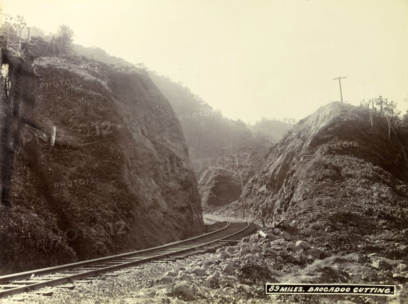 Track at 'Brocadoo Cutting'. A newly completed railway track winds around boulders at 'Brocadoo Cutting'. Jamaica, circa 1895. Jamaica, Caribbean, North America .