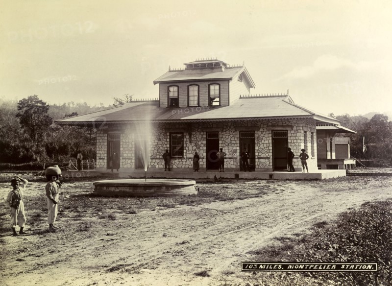 Montpelier railway station. A fountain brightens up the patch of rough ground outside Montpelier railway station. Montpelier, Jamaica, circa 1895. Montpelier, St James (Jamaica), Jamaica, Caribbean, North America .