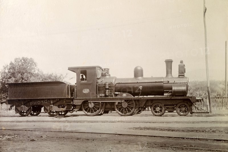 British steam locomotive. No. 10', a British-manufactured steam locomotive sits on rails at a siding. Jamaica, circa 1895. Jamaica, Caribbean, North America .