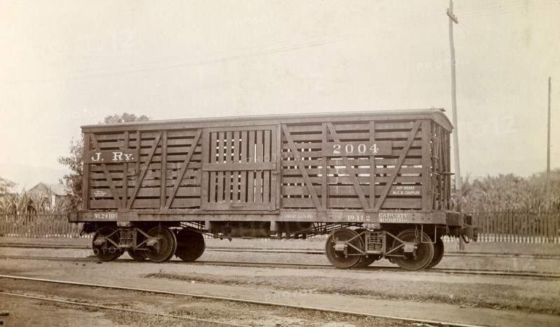 Jamaica Railway wagon. A closed railway wagon inscribed 'J. RY.2004', sits on rails at a siding. Jamaica, circa 1895. Jamaica, Caribbean, North America .