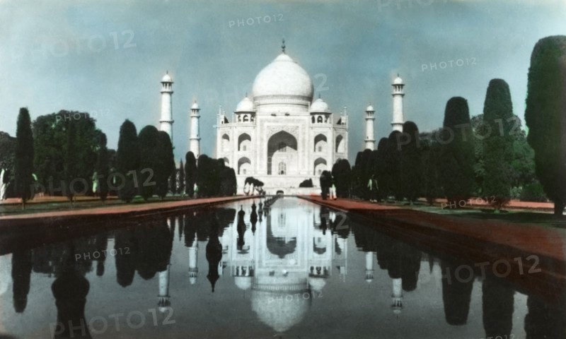 The Taj Mahal, circa 1925. View of the Taj Mahal, reflected in the central canal running up to its main entrance. Agra, United Provinces (Uttar Pradesh), India, circa 1925. Agra, Uttar Pradesh, India, Southern Asia, Asia.