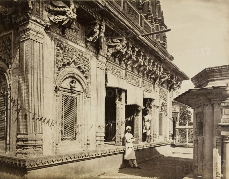 Raja Amethi's temple. View of an exterior carved stone wall, decorated with strings of bunting, at Raja Amethi's Hindu temple. Benares, North Western Provinces (Varanasi, Uttar Pradesh), India, circa 1885. Varanasi, Uttar Pradesh, India, Southern Asia, Asia.