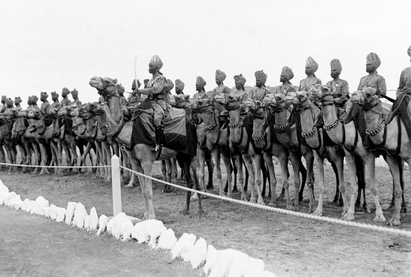 Royal camel escort at Aden. An Indian Army camel escort for King George V and Queen Mary. The royal couple stopped at Aden during their outward journey to India for the Coronation Durbar at Delhi. Aden, Yemen, circa 27 November 1911. Aden, Adan, Yemen, Middle East, Asia.