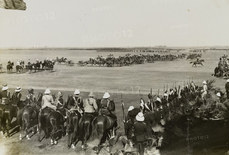 The Royal Horse Artillery. A section of the Royal Horse Artillery gallops past spectators during a display at King George V's Coronation Durbar. Delhi, India, 13 December 1911. Delhi, Delhi, India, Southern Asia, Asia.