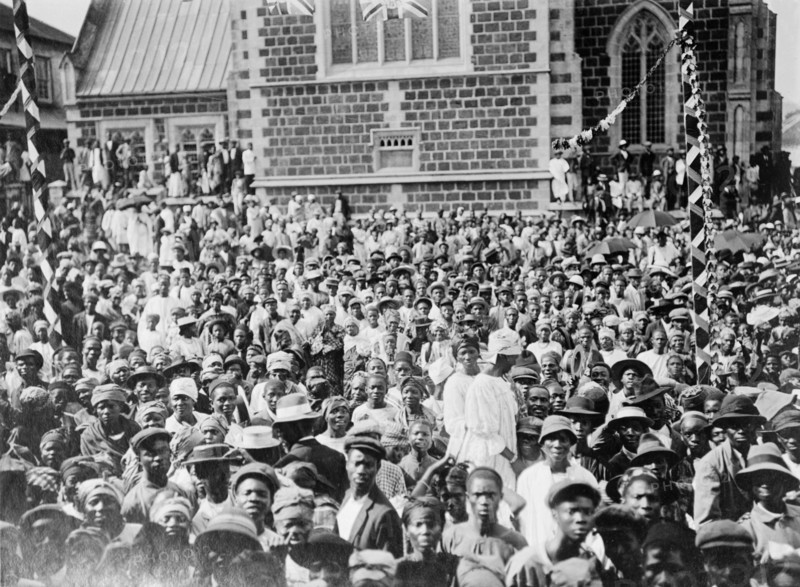 Crowd for the Duke of Connaught. A large crowd of African civillians gather outside a church in Salisbury at the reception of the Duke of Connaught. This was one of several stops made by the Duke following his official visit to Cape Town to open the new Union Parliament. Sailsbury, Southern Rhodesia (Harare, Zimbabwe), 18 November 1910. Harare, Harare City, Zimbabwe, Southern Africa, Africa.